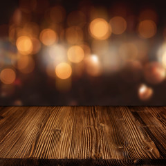 Wall Mural - Celebratory bokeh background with wooden table