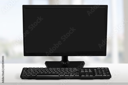Fotografia Desktop computer and keyboard on background