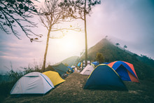 Adventure Camping And Tent On The Top Of Mountain , Hiker Take A Rest On This Camp , Travel Concept At Khao Chang Phueak , Thong Pha Phum National Park ,Thailand
