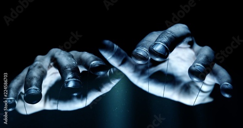 Fotografía Puppet hands from leadership controlling our lives. Concept