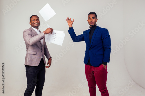 Cuadros en Lienzo two handsome young Afro American businessman in classic suit rejoicing and exult