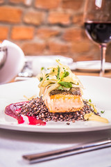 Sticker - Baked salmon, beetroot mousse, black lentils and pear