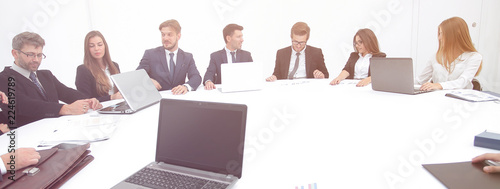 Fotomural meeting of shareholders of the company at the round - table.