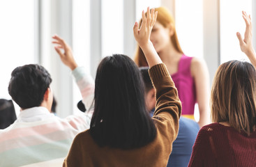 Wall Mural - group of young people raising hands up.