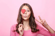 © 5second - Young girl holding red heart on pink background