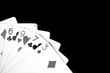 Playing cards on a dark background close up. Black and white