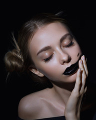 Wall Mural - Black lips. Halloween Makeup. Luxury beautiful woman with dark lipstick. Beauty stylish girl with closed eyes