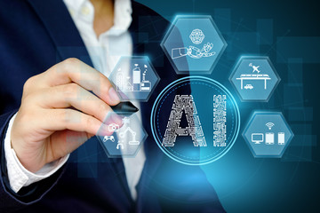 Businessman showing Artificial intelligence concept with related icon..