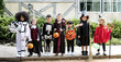 Diverse kids in Halloween costumes