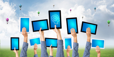 Close of businessman hands in line showing tablet pc with blank blue screen