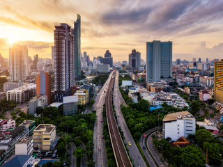 Wall Mural - aerial view of bangkok skyline panorama and skyscraper with light trails on sathorn road center of b