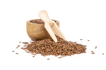  Fresh brown flaxseeds isolated on white