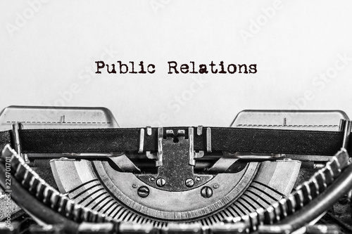 Fotografie, Tablou Public Relations text typed on a Vintage Typewriter