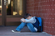 © Roman Bodnarchuk - Schoolboy crying in the yard of the school