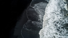 The Black Sand Beach In Iceland. Sea Aerial View And Top View. Amazing Nature, Beautiful Backgrounds And Colors.