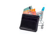 © ramdannain - Black PU leather men’s wallet with Malaysian Ringgits and a shopping cart, isolated on white background. Buying and spending concept