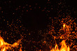 Leinwandbild Motiv Fiery fire isolated on black isolated background . Beautiful yellow, orange and red fire flame texture style.