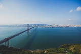 Fototapeta  - Beautiful panoramic view of 25th of April Suspension Bridge, 25 de Abril Bridge, over the Tagus river in Lisbon, Portugal