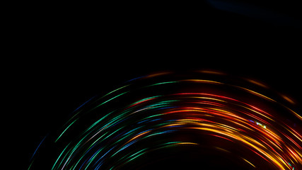 Neon sparks on a dark background. Abstract dark background.