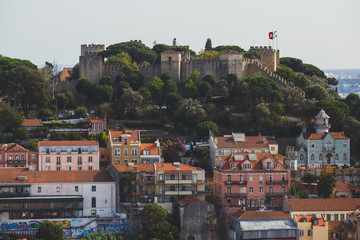 Wall Mural - Beautiful super wide-angle aerial view of Lisbon, Portugal with harbor and skyline scenery beyond the city, shot from  belvedere observation deck