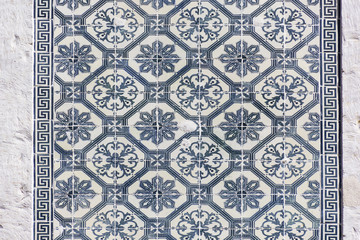 Naklejka na meble background image of old colorful Portuguese tiles Azulejos, historical patterns, covering the old house in Portugal