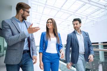 Wall Mural - group of managers talking in the business cente