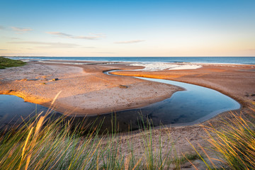 Wall Mural - dunbar burn meanders across druridge bay / druridge bay is a seven mile long beach in northumberland