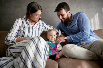 Wall Mural - Happy mother, father and cute son, happy family lifestyle.