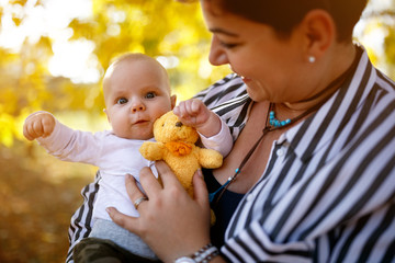 Baby with mother in park