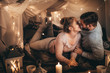 canvas print picture - Couple on bed together in romantic mood