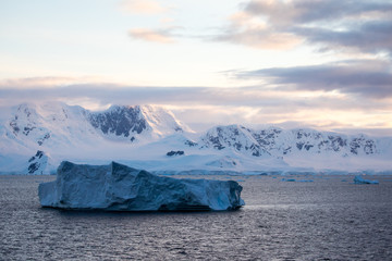 ice in the Antarctica with iceberg in the ocean