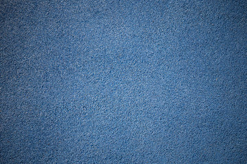 Rubber floor texture. Granules playground cover background.