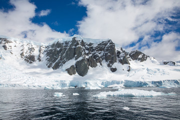 ice in the Antarctica with iceberg in the ocean