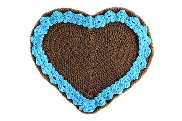 Wall Mural - hand crochet Gingerbread heart shape valentines day gift with copy space on white isolated background.