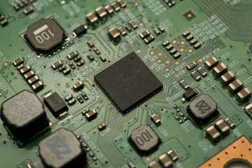 A complex PCB mounted board with surface mount electronic parts