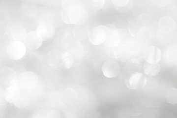 A brilliant blurry white background for a festive mood. Template for greeting card for entertainment.