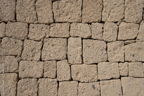 Fototapeta ignimbrite stone wall - natural stone wall background