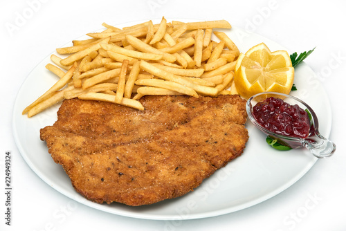 Fotografía Italian food, Milanese schnitzel with fries served on white plate, isolated on