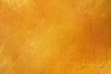 Wall Mural - abtract grunge surface orange gold background golden yellow highlights