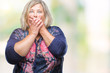 © Krakenimages.com - Senior plus size caucasian woman over isolated background shocked covering mouth with hands for mistake. Secret concept.