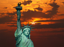 The Statue Of Liberty At Sunrise