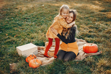 Family with pumpkins