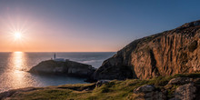Sunset At South Stack Lighthouse On Anglesey In Wales