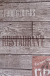 © Aniruth - brick wall and wood floor background
