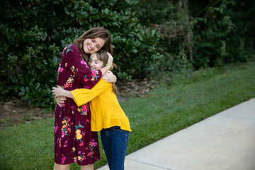 Wall Mural - Mother and Tween Daughter Outside