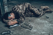 © VadimGuzhva - Soldier In Camouflage Is Sleeping In War Shelter.