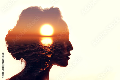 Cuadros en Lienzo Psychology concept. Sunrise and woman silhouette.