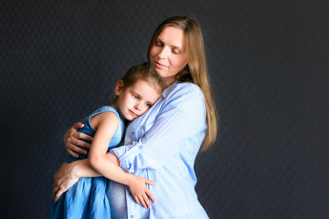 Wall Mural - Happy Mother's Day.  Happy family mom and daughter hugs.