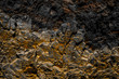 © hanohiki - black rock background with golden / yellow color