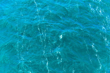 Wall Mural - Sea background, water texture - water with small waves, top view